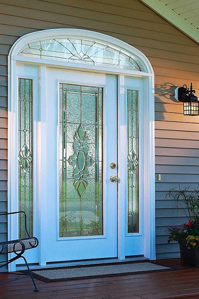 Storm doors with decorative glass